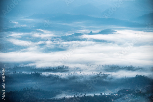 Fototapeta Naklejka Na Ścianę i Meble -  View of  foggy on mountain in tropical rainforest at the morning