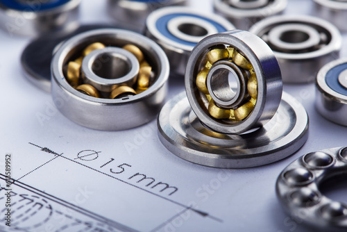 bearings of different types, micrometer, caliper and ruler on the drawings of technical products. Technologies and engineering.