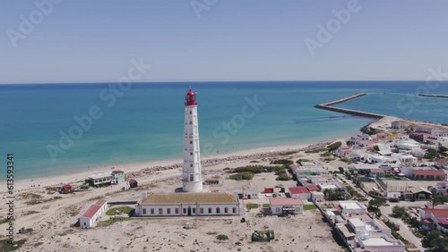 Aerial seascape view of Ilha do Farol (lighthouse island), in Algarve Tourism Destination Region, in Portugal south coast.
