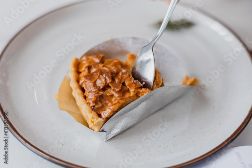 Almond Cake served with Plate , homemade coffee almonds cake 