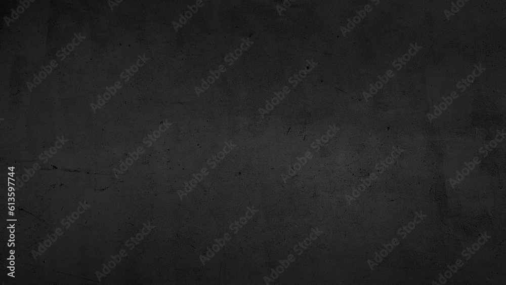 large dark black background image of rough raw concrete wall in loft style. modern black concrete wall decoration. cement floor texture use for background.