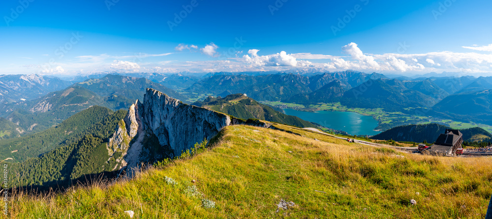 Top of Schafberg hill, Austria. View of big rock on top of mountain. Summer hiking.