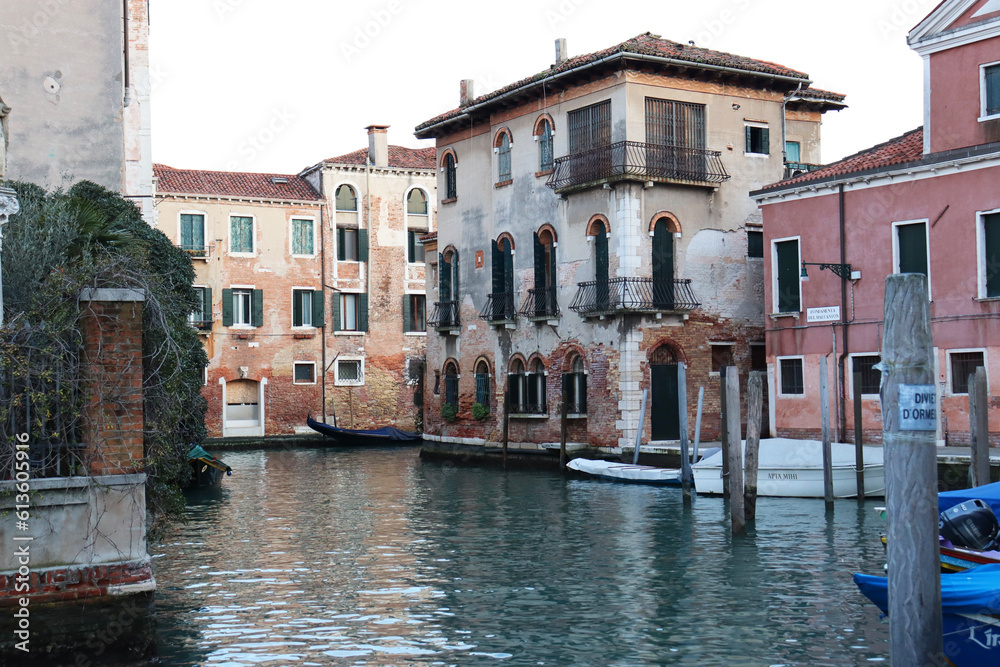 Colorful houses near water in the old medieval street in Venice isolated PNG photo with transparent background. High quality cut out scene element. Realistic image overlay