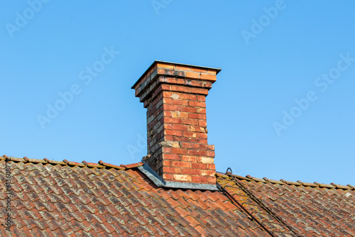 Chimney made of orange bricks © Johanna H