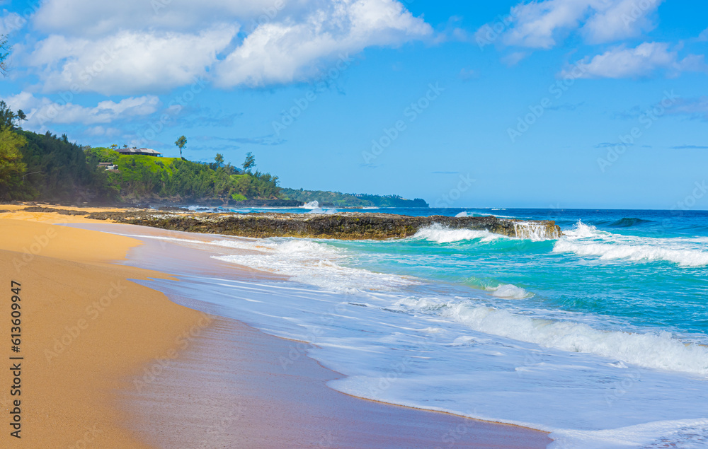 Waves on The Sandy Shore of Kauapea Beach, Kauai, Hawaii, USA