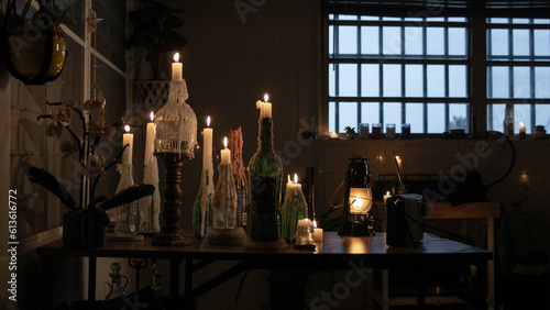 lot of candles over the table