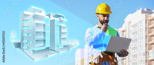 Male architect with laptop ...