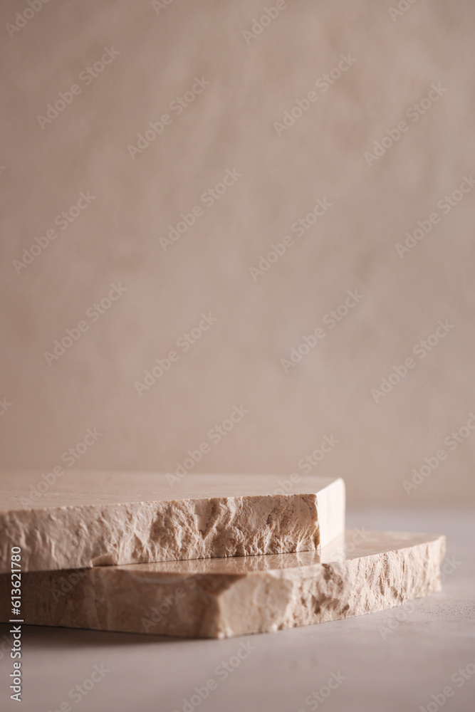 Minimal background for branding and product presentation.natural stone for product display on grey background.copy space.advertising and sale concept Minimal background for branding and product presentation.natural stone for product display on grey background.copy space.advertising and sale concept