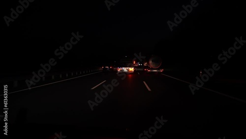 Fast driving on the german autobahn at night. Traffic on a German highway. no limits photo