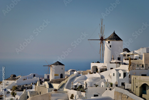 windmills in Oia city on Santorini islands, Greece. One of the most famous and romantic touristic destination in the world.