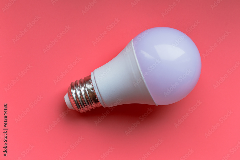 Led lamp, white lamp socket e27 on a pink background, for design Led lamp, white lamp socket e27 on a pink background, for design