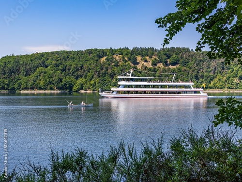 Passenger ship and fishing boat on the Edersee photo