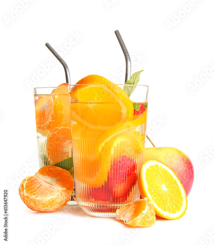 Fototapeta Naklejka Na Ścianę i Meble -  Glasses of infused water with different sliced fruits on white background