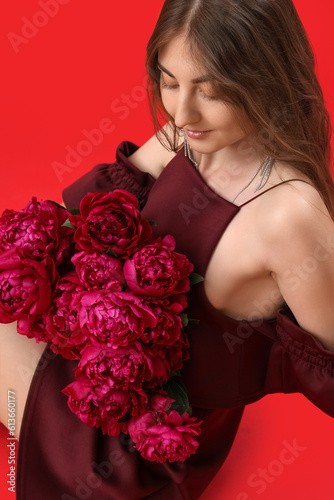 Beautiful young woman with ...