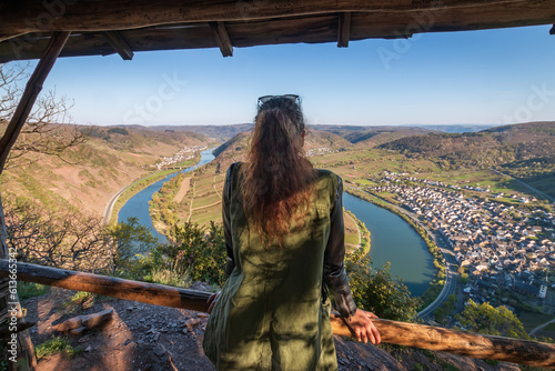 Canvas Print Woman at scenic view from Calmont hiking trail to Moselle loop (germ
