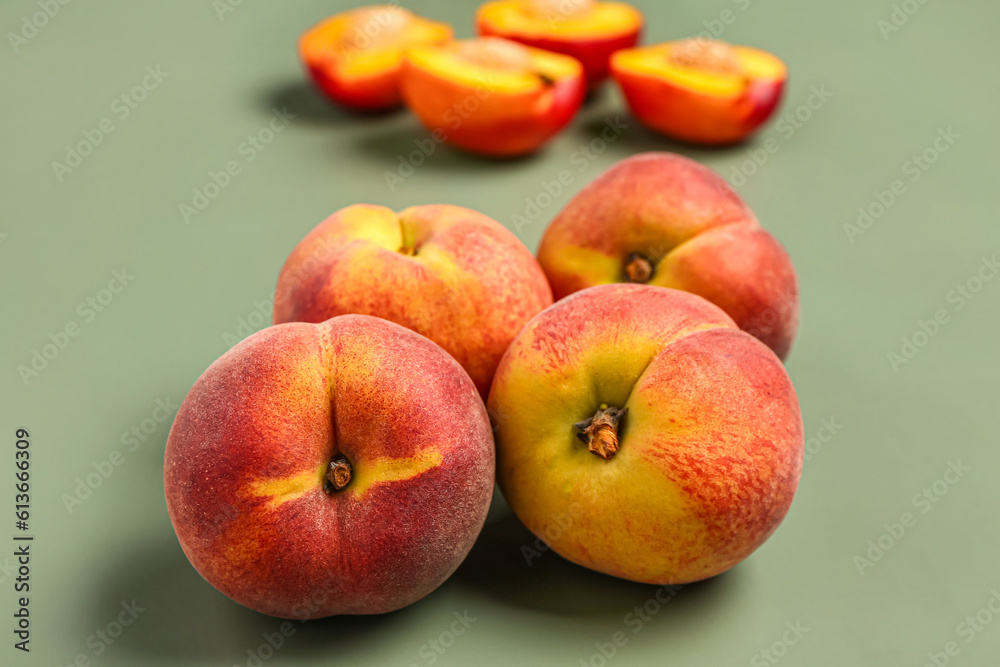 Many sweet peaches on grey background Many sweet peaches on grey background