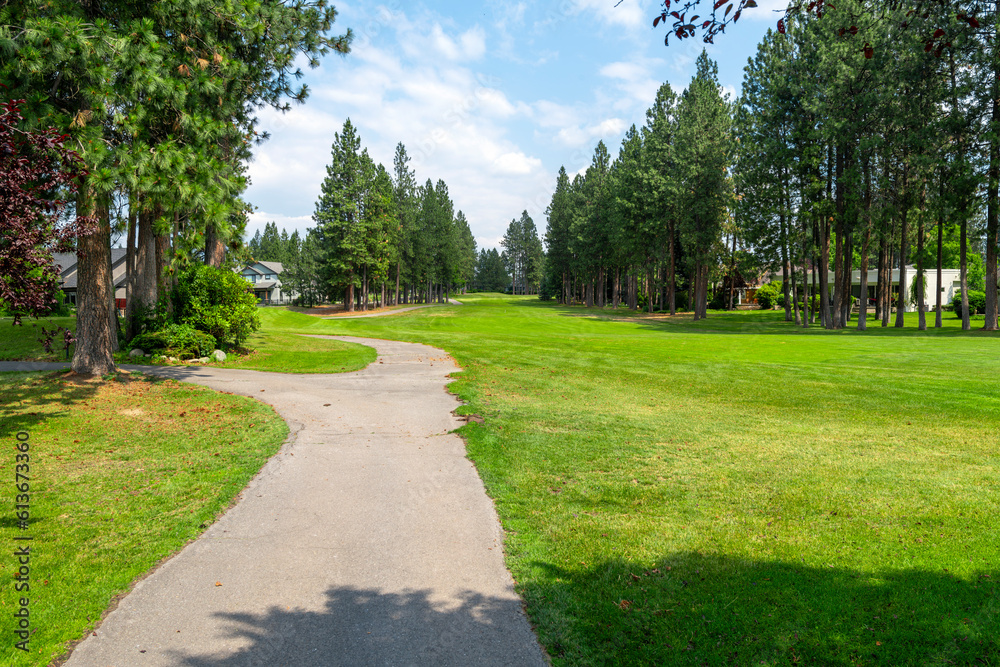 Manicured fairways, greens and hazards at a suburban golf course, part of a luxury golf community of homes in the rural town of Post Falls, Idaho, in the general Coeur d'Alene area of North Idaho.
