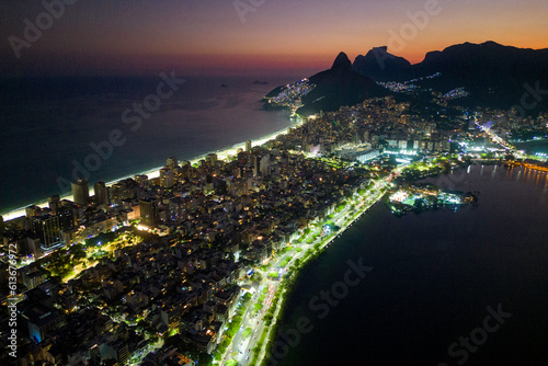 View of Ipanema and Leblon District Buildings and Mountains at Night in Rio de Janeiro, Brazil © Donatas Dabravolskas