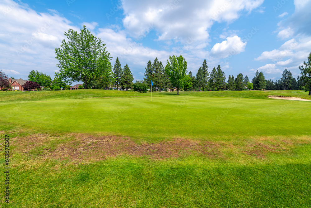 Manicured fairways, greens and hazards at a suburban golf course, part of a luxury golf community of homes in the rural town of Post Falls, Idaho, in the general Coeur d'Alene area of North Idaho.
Manicured fairways, greens and hazards at a suburban golf course, part of a luxury golf community of homes in the rural town of Post Falls, Idaho, in the general Coeur d'Alene area of North Idaho.