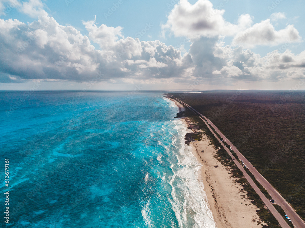 Drone shot showing beaches and the coast line on the diving island of cozmel in Mexico.
