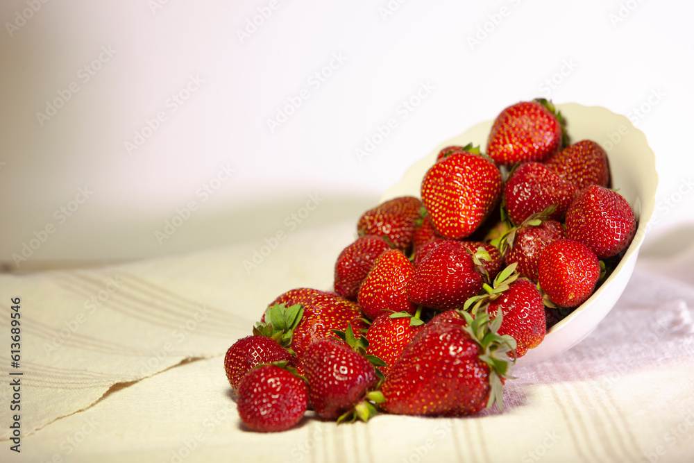 Bowl with ripe big strawberries. Copy space.
