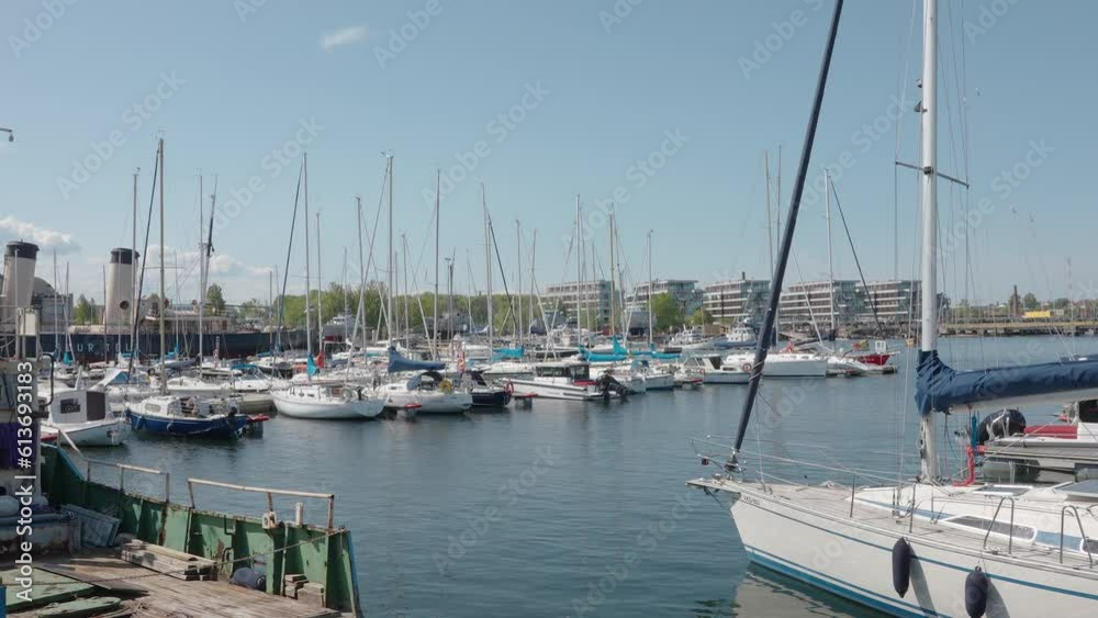 A look of the sailboat on the port on a hot sunny day in Estonia A look of the sailboat on the port on a hot sunny day in Estonia