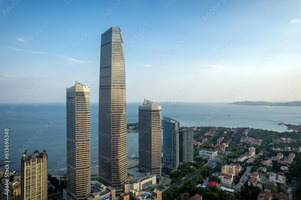 Fototapeta premium Aerial photography of modern architecture along the urban coastline of Qingdao