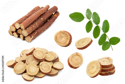 set of herbal medicine licorice root sticks and slices with leaf isolated on white background. photo