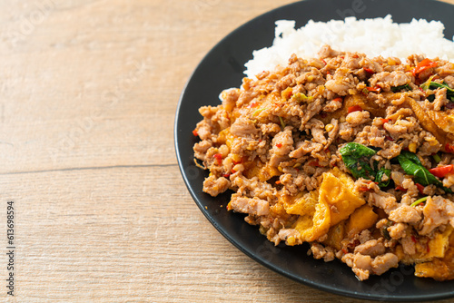 stir-fried minced pork with basil and egg topped on rice