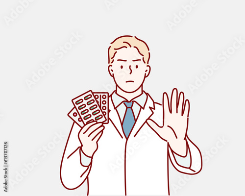 doctor hold pill with stop gesture. stop taking medication. Hand drawn style vector design illustrations. photo