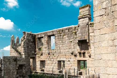 Guimaraes  Portugal. April 14  2022  Walls and structures of Guimar  es castle with blue sky.