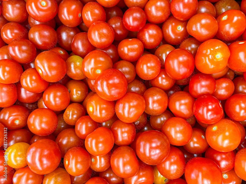 Lots of red tomatoes. Ripe tomato. Background with tomatoes. Lots of red tomatoes. Ripe tomato. Background with tomatoes.