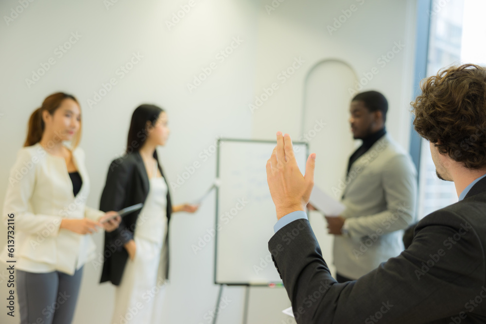 Group of multiracial officer including Asian, African, Caucasian having a meeting and presentation  in office.