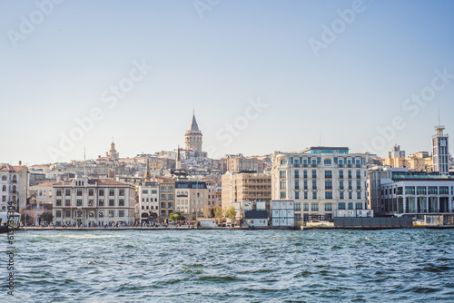 Istanbul city skyline in Turkey, Beyoglu district old houses with Galata tower on top, view from the Golden Horn