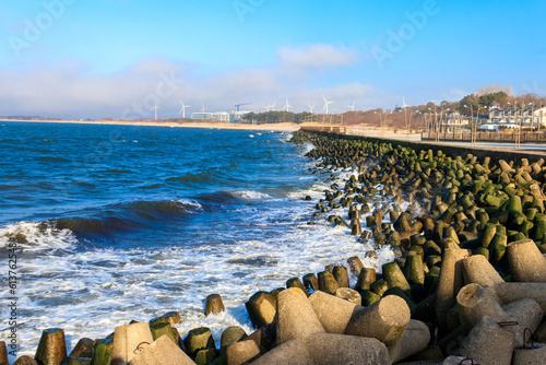 Fototapeta Naklejka Na Ścianę i Meble -  Storm in the Baltic sea. Storm waves crashing on the breakwater in Darlowo, Poland