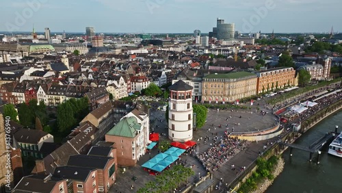 Drone shot of Burgplatz at sunset , a Historical landmark in Düsseldorf, North Rhine-Westphalia . The Burgplatz is a square located directly on the banks of the Rhine in Düsseldorf's old town.
