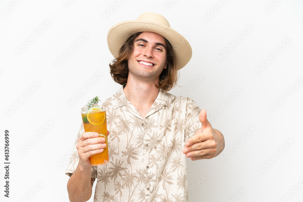 Young handsome man holding a cocktail isolated on white background shaking hands for closing a good deal Young handsome man holding a cocktail isolated on white background shaking hands for closing a good deal
