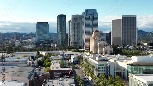 Drone shot rising over Century City in Los Angeles with Fox Studios photo