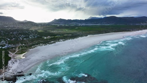 Noordhoek Long Beach Chapman Peak South Africa aerial cinematic drone waves crashing coastline Cape Town Hout Bay Fish Hoek Good Hope Simon's Town stunning aqua deep blue water white sand forward up photo