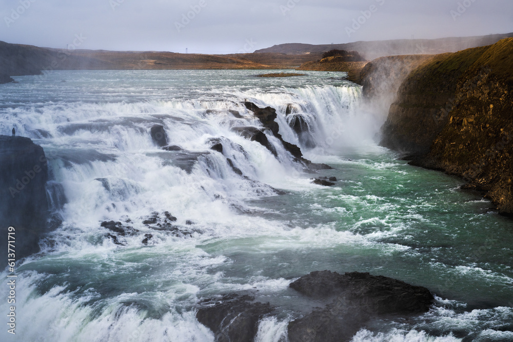 Beautiful gullfoss waterfall in iceland on the golden circle in summer falling down in two steps Beautiful gullfoss waterfall in iceland on the golden circle in summer falling down in two steps