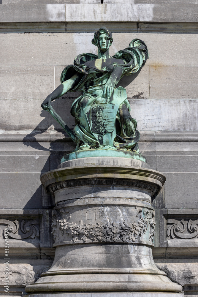 One of the sculptures on the base of triumphal arch Cinquantenaire Arch, Brussels, Belgium