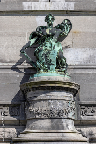 One of the sculptures on the base of triumphal arch Cinquantenaire Arch, Brussels, Belgium
