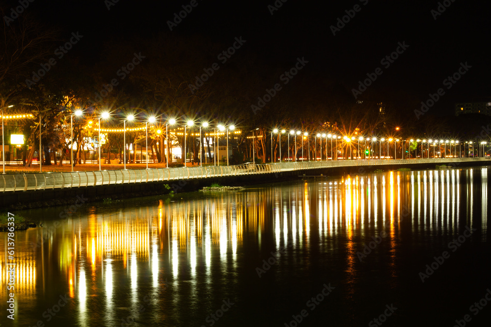 lake and ligh in city at night