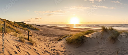 Sunrise on a dune beach with clear sky