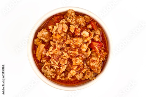 Bolognese sauce in a bowl, isolated on white background.