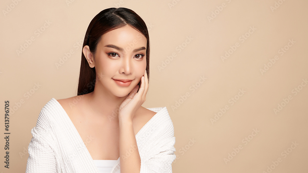 Beautiful young asian woman with clean fresh skin on beige background, Face care, Facial treatment, Cosmetology, beauty and spa, Asian women portrait. Beautiful young asian woman with clean fresh skin on beige background, Face care, Facial treatment, Cosmetology, beauty and spa, Asian women portrait.