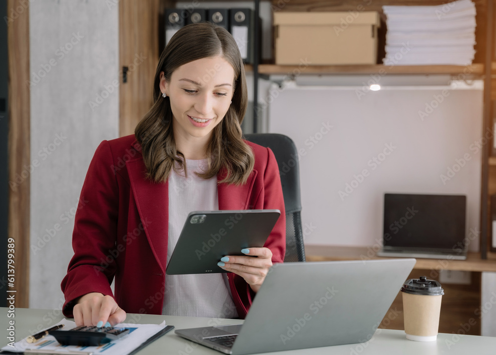 woman doing finance at home office with calculate expenses. woman doing finance at home office with calculate expenses.