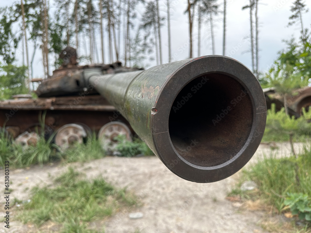 Armored transport burnt from a shell. Military Russian tank shot down in battle. Exploded tank, rusty armor, remnants of equipment. Armored transport burnt from a shell. Military Russian tank shot down in battle. Exploded tank, rusty armor, remnants of equipment.