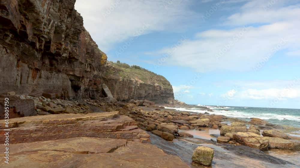 Stunning beauty of Australian coastal landscapes with this high-quality 4k static shot. Serene ocean, rocky cliffs, and picturesque scenery. Perfect for travel and nature enthusiasts.