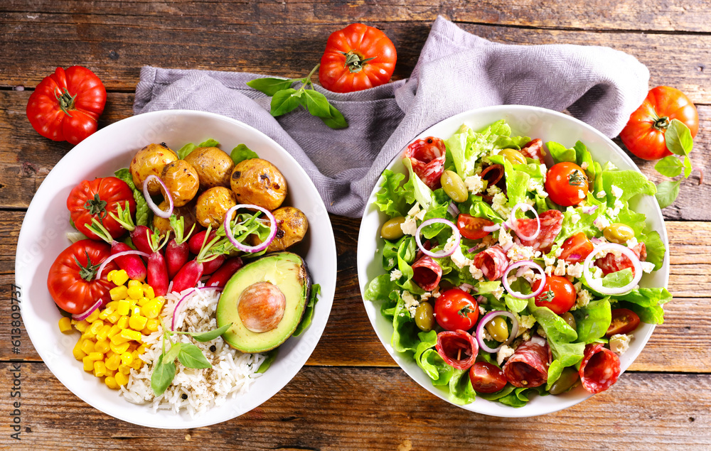 different sort of vegetable salad- vegetarian salad and salad with salami different sort of vegetable salad- vegetarian salad and salad with salami